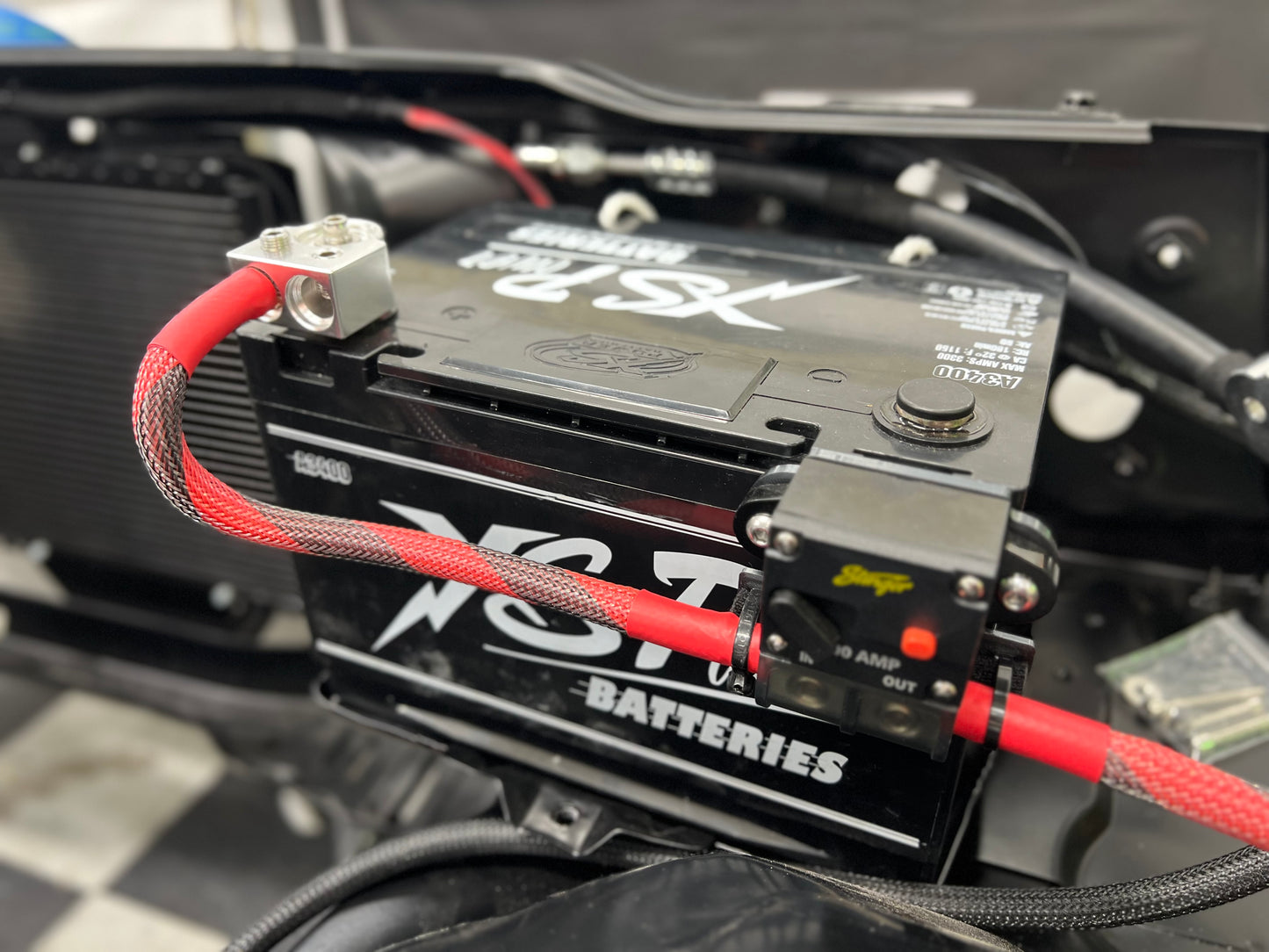 XS power battery breaker mounting bracket